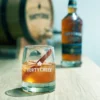 A whisky cocktail and bottle of Forty Creek Double Barrel whisky