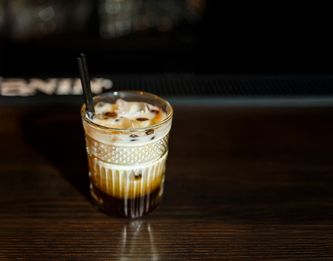 An iced coffee cocktail made with Forty Creek Cinnamon Bun Cream Liqueur